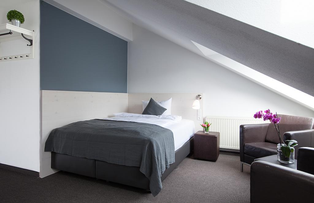 Alpengluehen Smart Hotel Ольхинг Номер фото